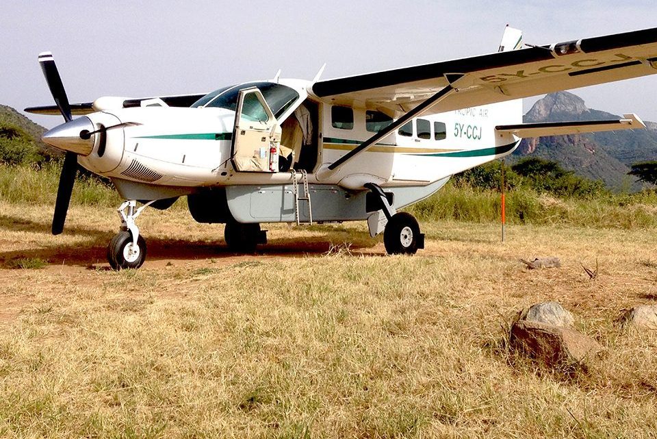 A light aircraft on a bush airstrip